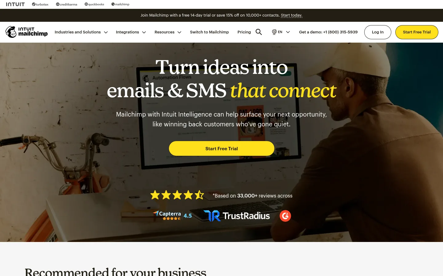 Mailchimp website, showing the home page headline about emails and SMS with a free trial button