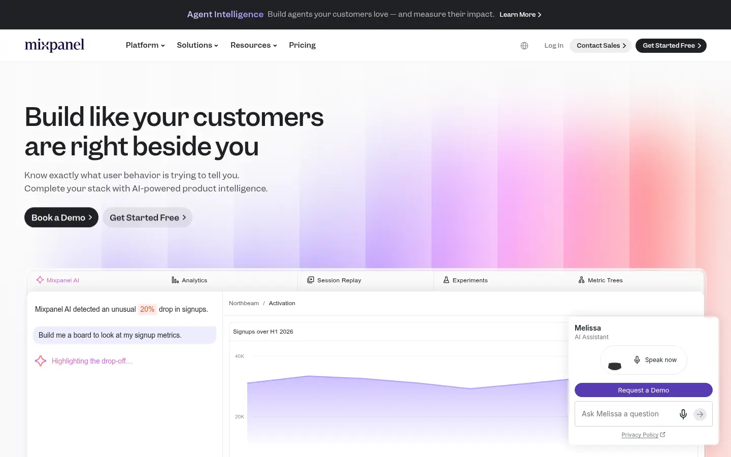 Mixpanel website, showing the headline Build like your customers are right beside you above an analytics preview