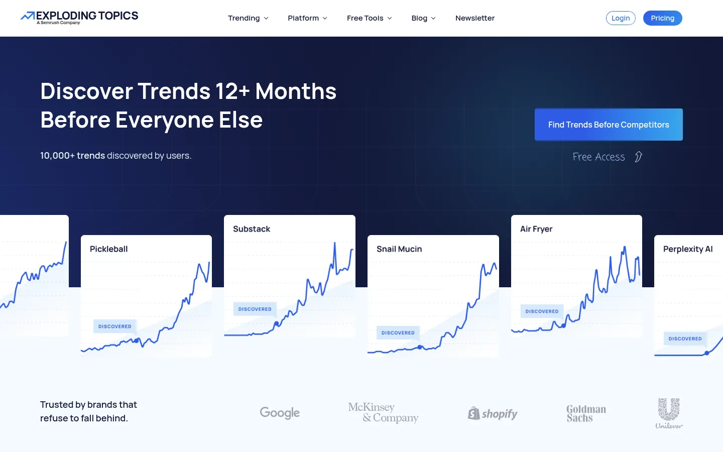 Exploding Topics website, showing the home page above trend charts for rising topics