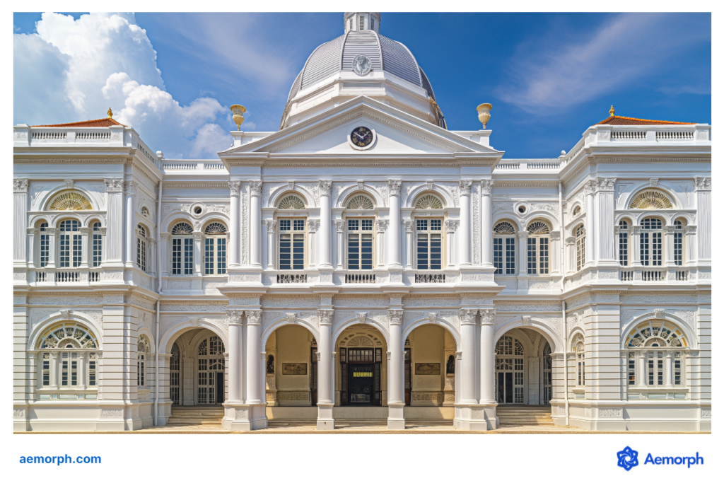 Elegant white colonial-style facade of the National Museum of Singapore on a sunny day.